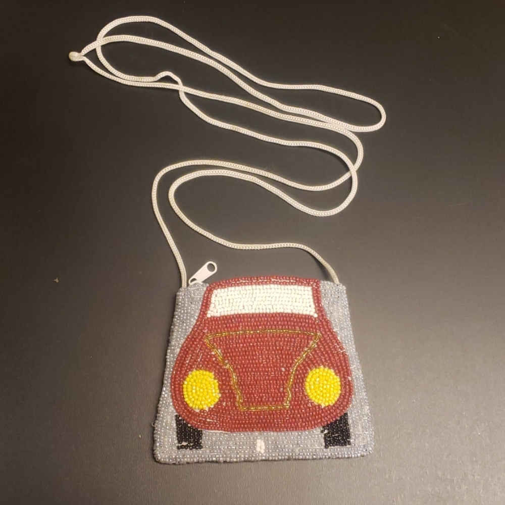 Sakura beaded crossbody coin bag.